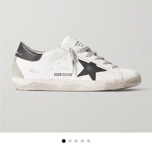 Golden Goose Superstar Distressed White and Black Star Sneakers